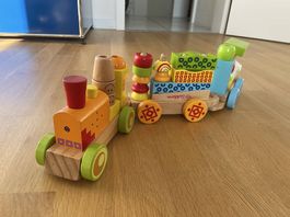 Holzzug mit Bausteinen und Wagons Batteriebetrieben