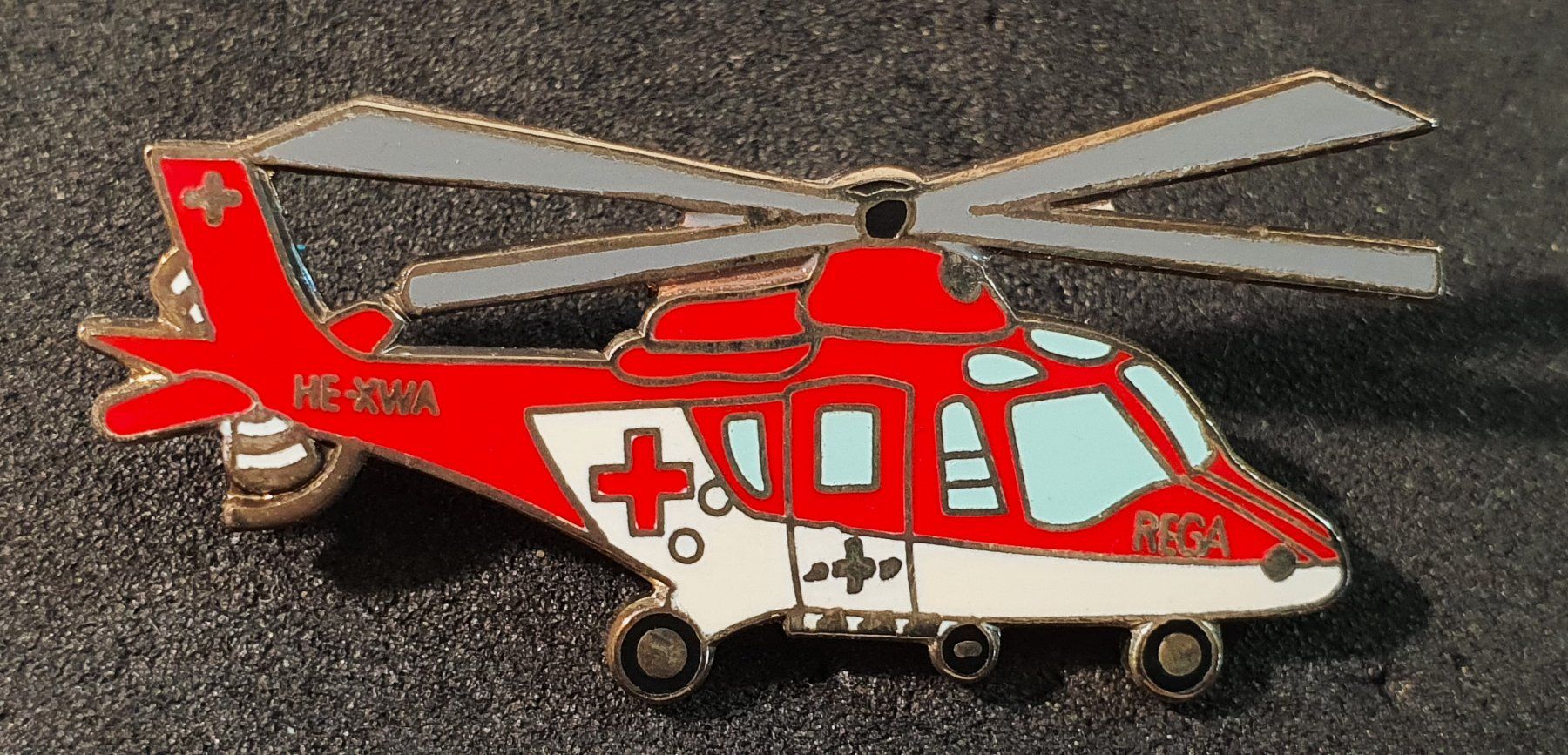 Rega Placchette & Badge: GG083 - Pin REGA Helikopter – Usato da Reinach BL venduto da Boston-Verkauf