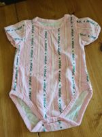 Body mit Blumenmuster Grösse 56/62 rosa