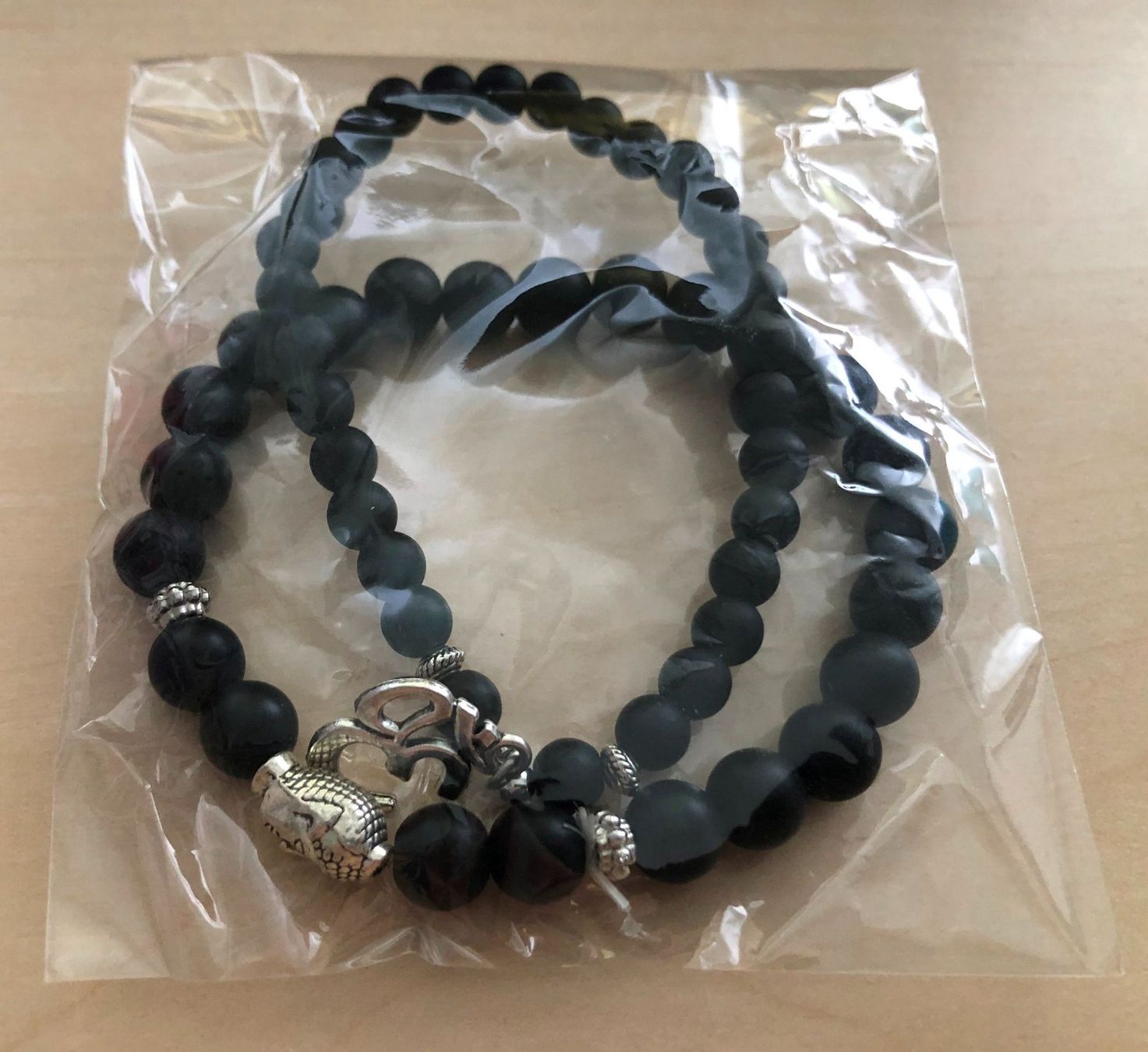 Armbänder & -reifen: 2er-Set Armbänder Buddha + Om-Symbol matter, schwarzer Achat – Neu und originalverpackt aus Gossau/ZH von amazonas66 3