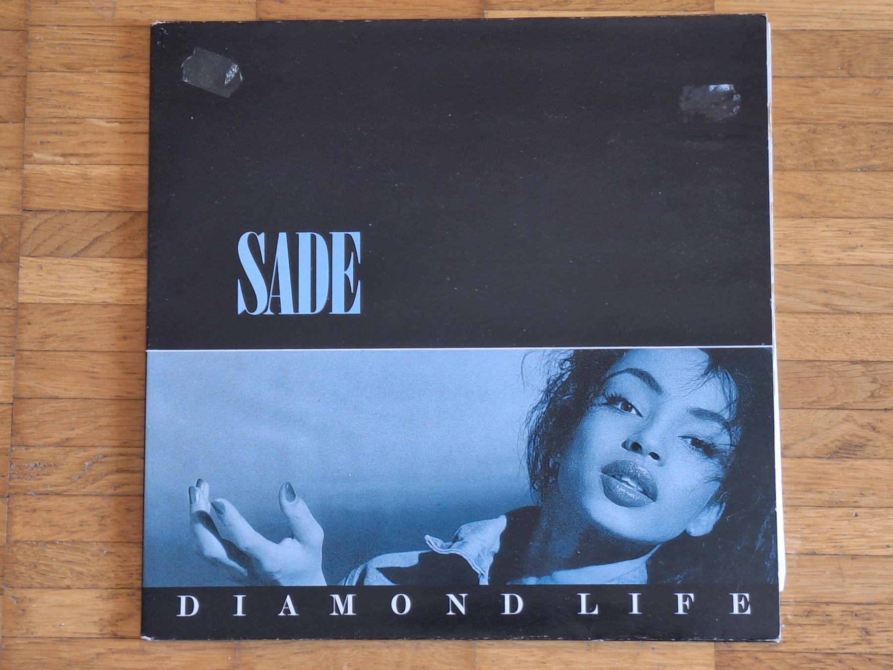 Dischi in vinile: Sade, Diamond Life - Vinyl LP EU 1984 – Nuovo (secondo la descrizione) da Oberentfelden venduto da Musicud
