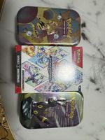 1xBooster Bundle 1x Mini Tin Prismatische und 1x151 Mini Tin