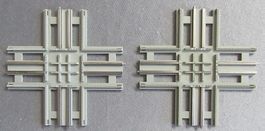 2 hellgraue Lego Kreuzungen - Eisenbahnschienen