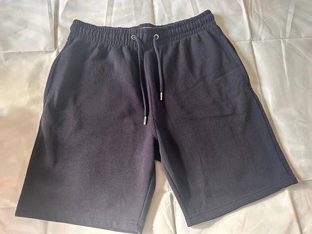 Short bleu foncé homme neuf Primark ? Taille M