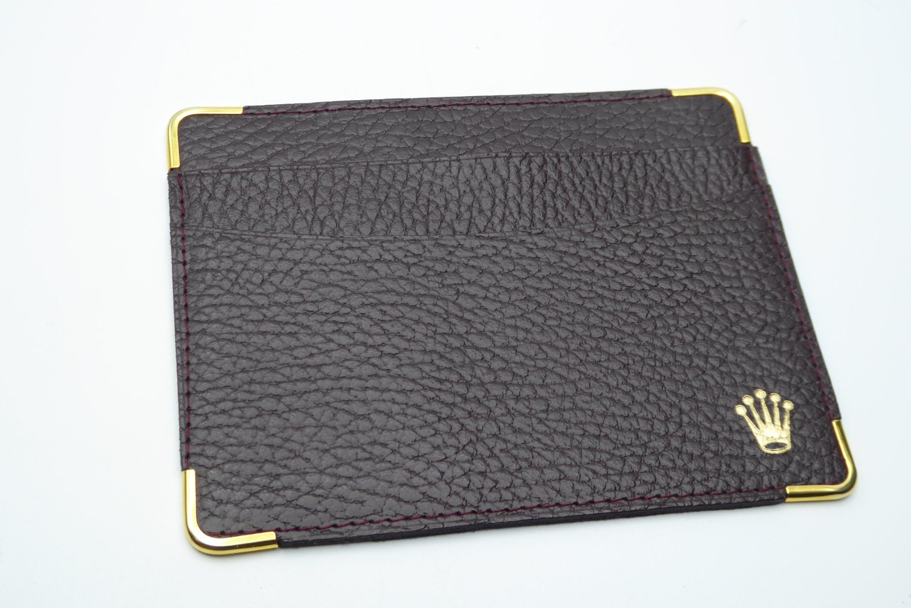 Rolex Orologi: Rolex Card holder brown code. 101.70.55 – Usato da Geneve venduto da adr_xk6n