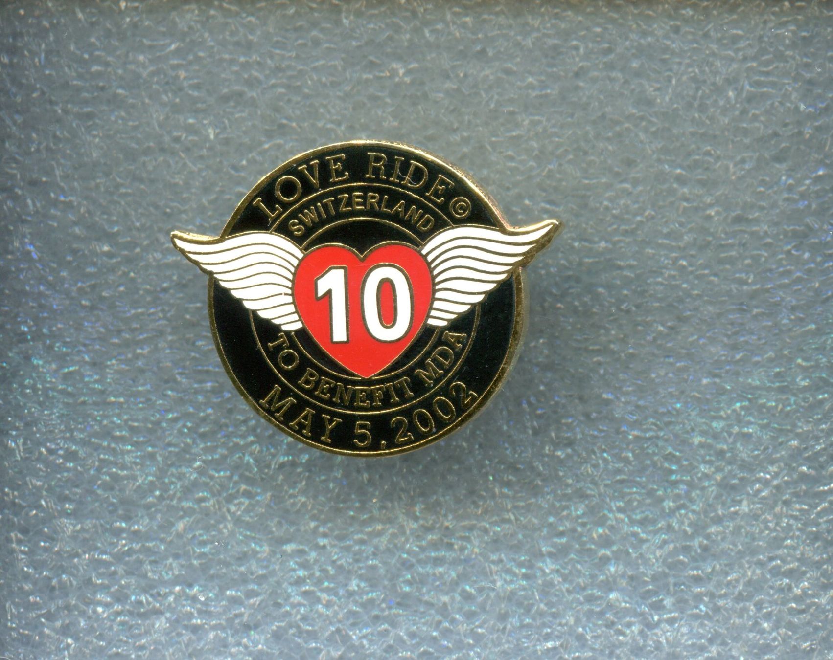 Placchette & Badge: LOVE RIDE 10  May 5. 2002 – Usato da Winterthur venduto da Sammleroase