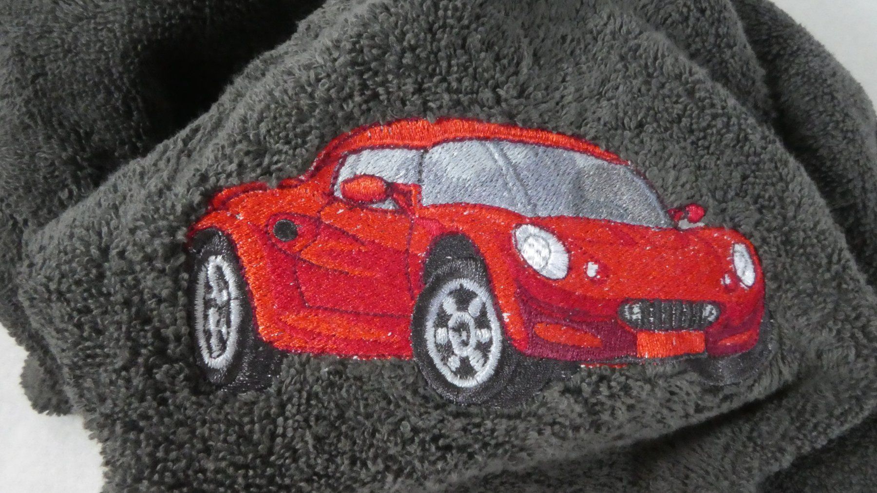 Serviettes de bain: Handtuch bestickt Auto statt Fr. 32.- Neu – Neuf avec emballage d'origine à Knutwil par Geschenksatelier 2