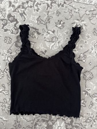 Top schwarz Rüschen