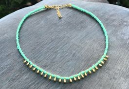 Collana perline turchesi con pendenti oro nuovo