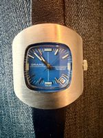 Montre Orano NOS Swiss Automatique day date bleu vintage