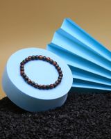 Elastisches Armband aus rotem Tigerauge und Ebenholz
