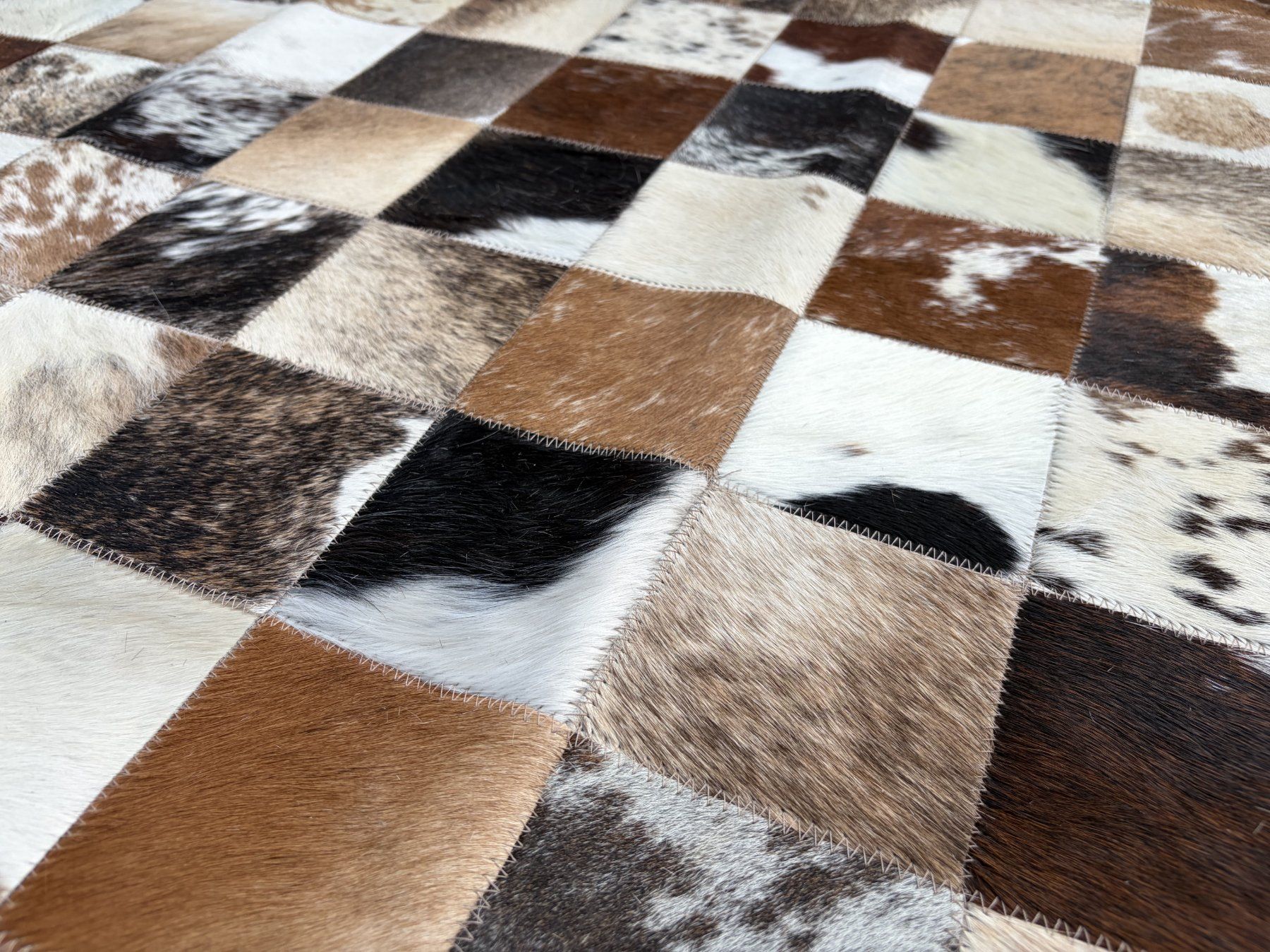 Teppiche: Kuhfell Teppich Patchwork – Neu und originalverpackt aus Arbedo von patagonialeatherrugs 5