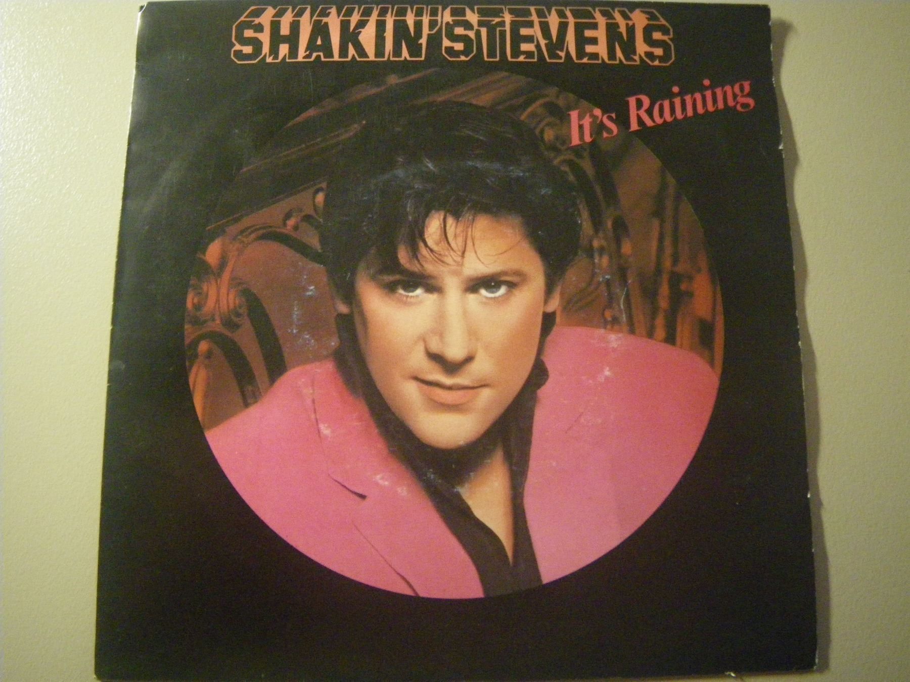 Dischi in vinile: Vinyl Single Shakin' Stevens - It's Raining – Usato da Langenthal venduto da Modo39