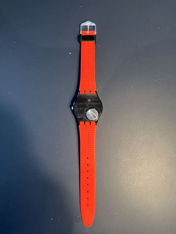 Swatch Uhren: Klassische Swatch Uhr mit orangen Armband – Gebraucht aus Lupsingen von sil_l6wg 1