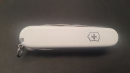 1 x Victorinox Sackmesser weiss und 1 x Messer Fa. AMAG