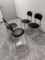 4 Stühle, schwarz, Metallgestell
