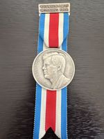 Medaille Kennedy-Lauf 1964 mit Startliste