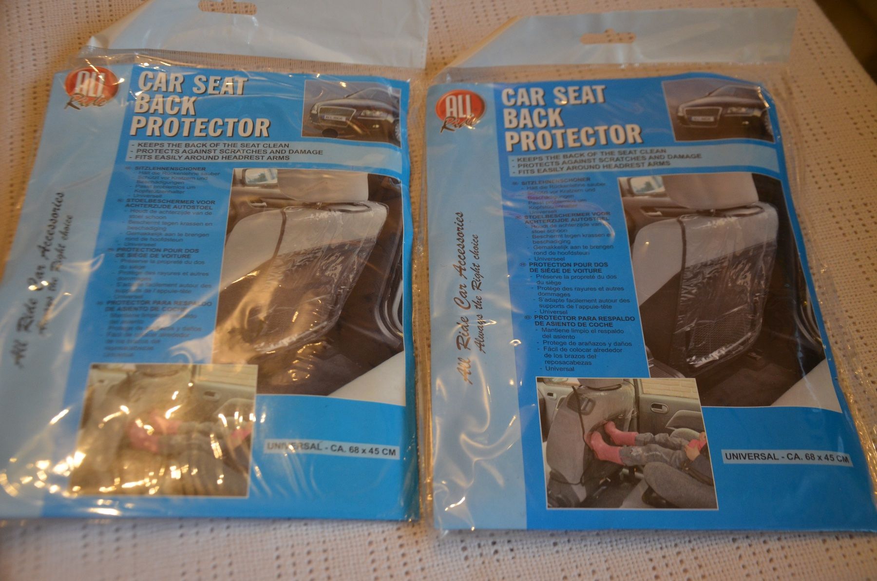 Seggiolini per auto: 2 CAR PROTECTOR NEU – Nuovo e nell'imballaggio originale da Chiasso venduto da Dolly015