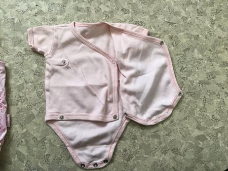Süsser Baby Body Grösse 56/62, Rosa.