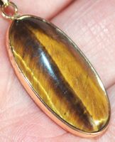Halskette 4586 – Oval – Tigerauge– 15x30 goldig eingefasst