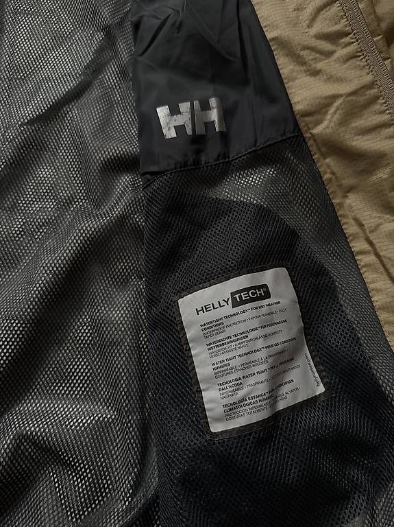Helly Hansen Giacche: Helly Hansen Regenjacke Helly Tech Gr. L, Beige/Schwarz – Usato da Basel venduto da mus_wqh8 2