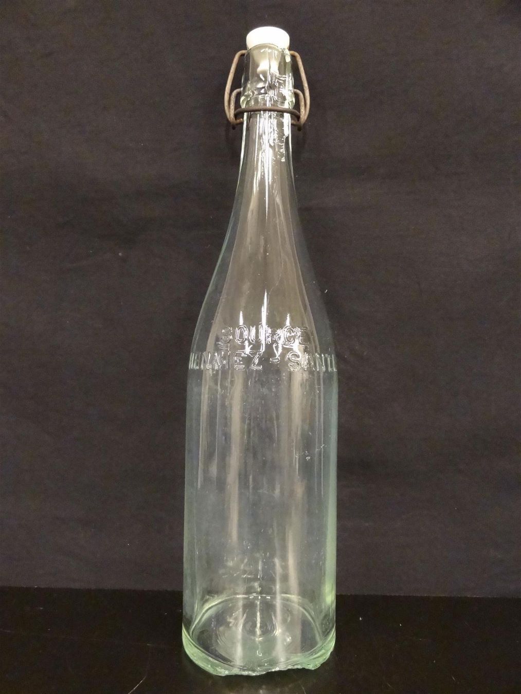 Bicchieri, Caraffe & Bottiglie: alte Flasche HENNIEZ SANTÉ – Usato da Kerzers venduto da Flaschenposten