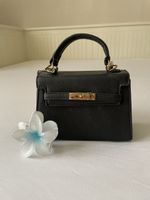 Sac à main noir élégant - Parfait pour l'été!