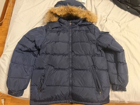 Piumino Moncler blu con cappuccio in pelliccia taglia M