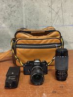 Nikon EM Camera with Series E Lens and Sigma Zoom Set