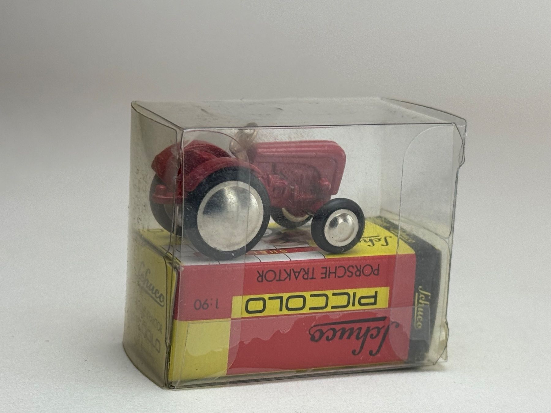 Schuco Modellini d'auto: CH- Schuco Porsche Schlepper rot – Usato da Elm venduto da Wikmtz 1