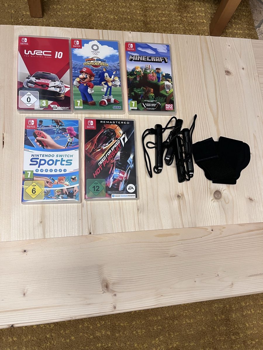 Nintendo Consoles: Nintendo Switch Oled mit 5 Spielen und 4 Controllern – D'occasion à Baden par Schlagwein 2