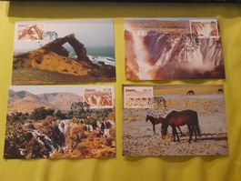 Lot de 4 cartes postales de Namibie avec timbres oblitérés.