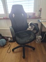 Fauteuil de bureau Gaming Conforama noir usé