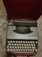 Machine à écrire Smith Corona Skyriter avec mallette