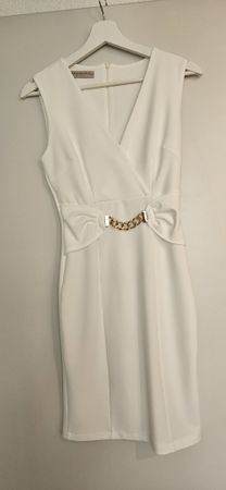 An Elegant dress from Rinascemento, size XS, color white.