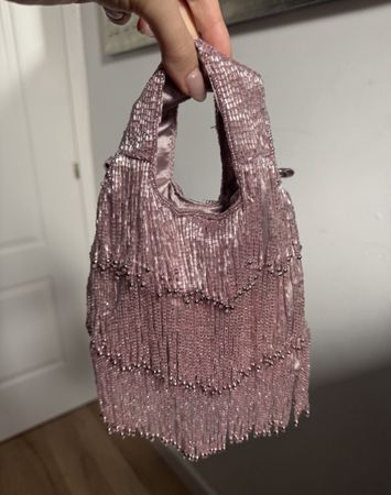 Handtasche mit Perlenbesatz rosa in benutztem Zustand