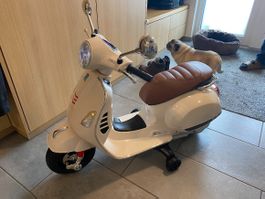 Moto électrique enfant Vespa blanche bon état
