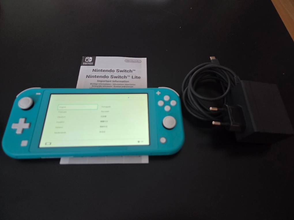 Nintendo Consoles: Nintendo Switch Lite - Türkis mit Reisecover – D'occasion à Vilters par oOLinkOo 1