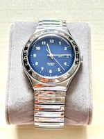 Swatch Uhr mit blauem Zifferblatt und Metallarmband guter Zu