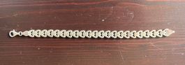 Bracelet en argent décorée en suite de coeurs