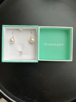 Boucles d’oreilles en or avec perles