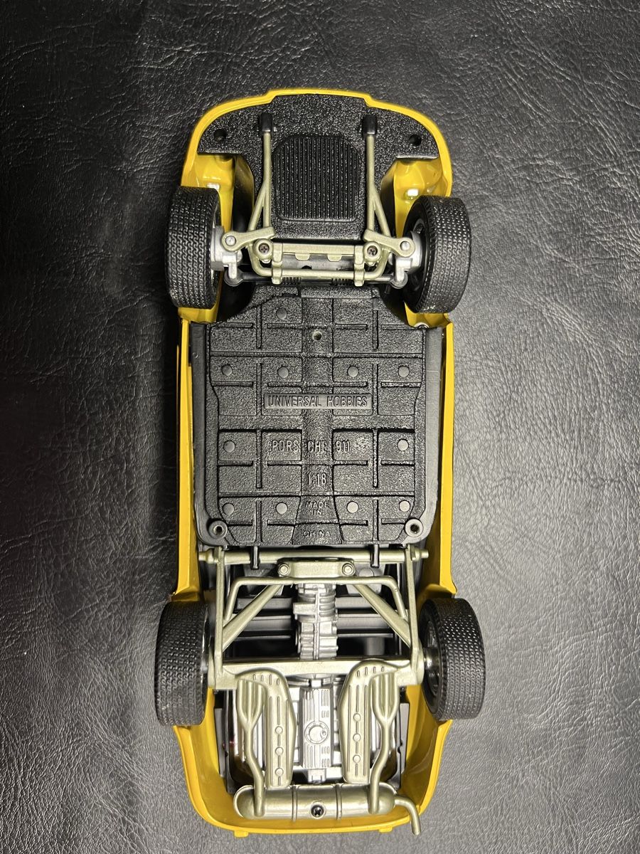 Bburago Modellini d'auto: Porsche 911 RS Modellauto gelb 1:18  – Usato da Moosleerau venduto da Tami8 2