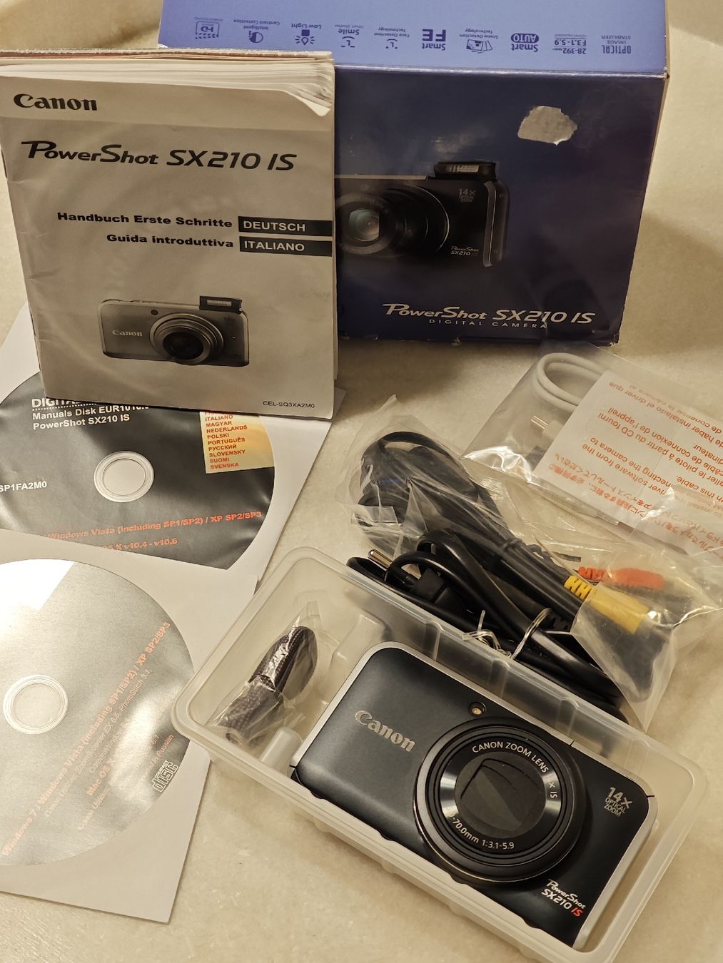 Canon Fotocamera: Canon PowerShot SX210 IS – Nuovo (secondo la descrizione) da Cham venduto da pot_lpv7 6