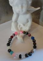 Kinder Armband mit Edel und Kunststeinen.