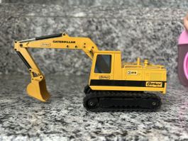 Caterpillar 215, 1:50 , NZG