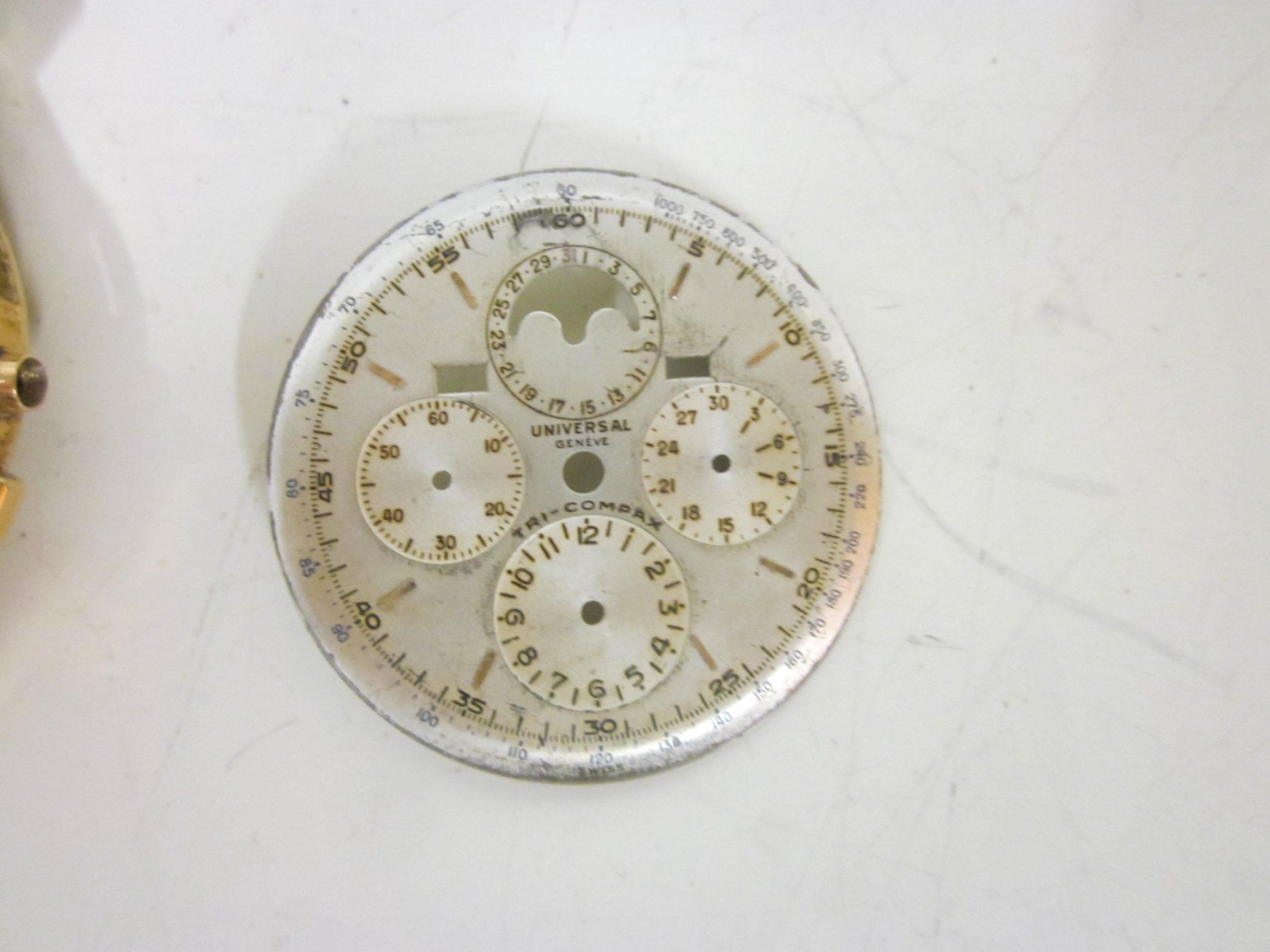 Universal Genève Uhren: UNIVERSAL GENEVE TRI COMPAX OR Chronomètre 1940 Défectueux – Defekt aus Grand-lancy von  6