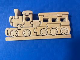 Holzspuzzle Zugwagon mit Lokomotive - 19 Teile