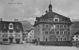 Ansichtskarte Rathaus Schwyz,  Weinhandlung Schuler, 1909