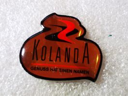 Ansteckpin 96: Kolanda