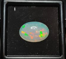 1x Opale 14x10 mm 2.61 ct - CERTIFICAT 620.- Fr